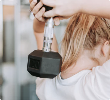 Girl lifting weight