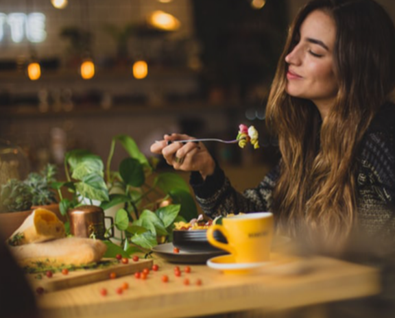 woman enjoying her dinner