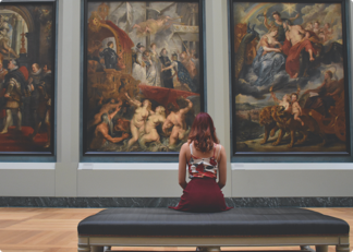 girl looking at art