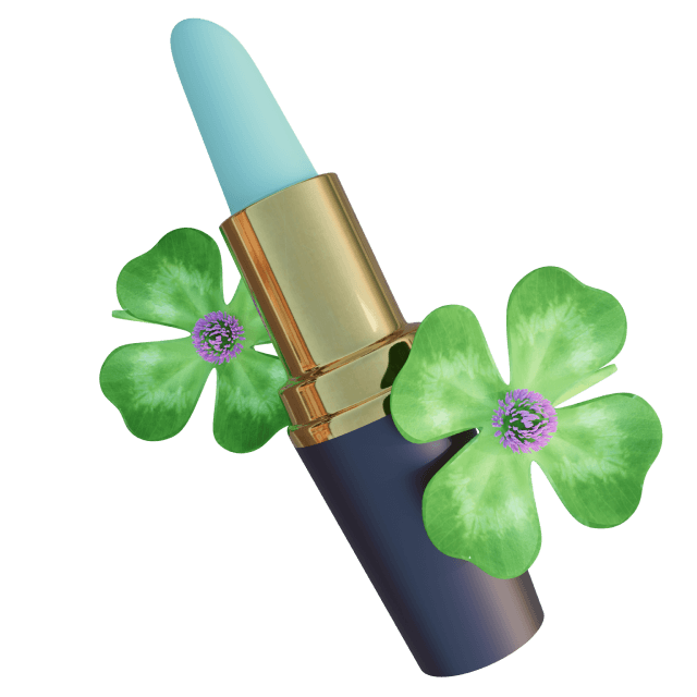 Lipstick and clovers floating in the air