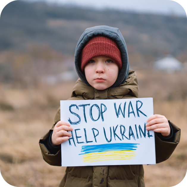 Kid holding sign