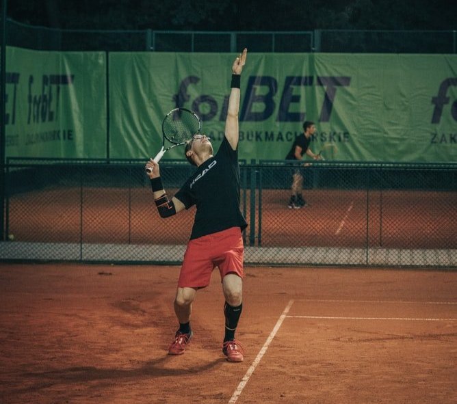 Man playing tennis